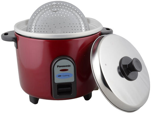 Red rice cooker with a steamer basket on a white background